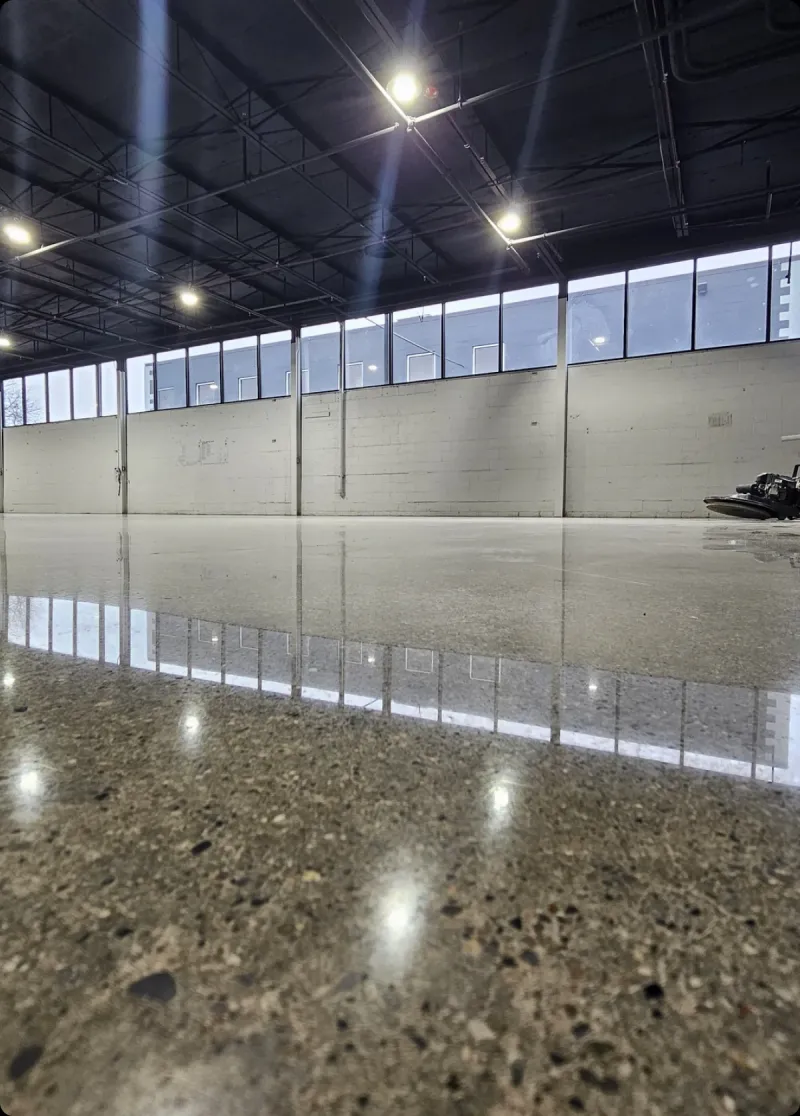 Concrete vs. Epoxy: A Technical Look at Why Tampa Floors Need More Than Bare Slab